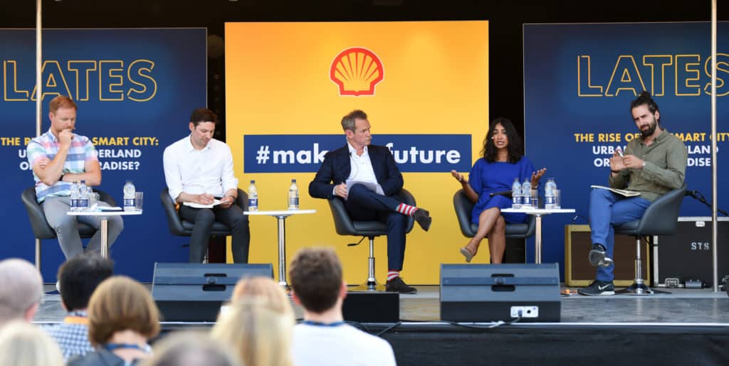 Alexander Armstrong, center, chairs a panel debate with Intelligence Squared, on day two of Make the Future Live 2018 at the Queen Elizabeth Olympic Park on Friday, July 6, 2018, in London. (Ed Robinson/Shell)